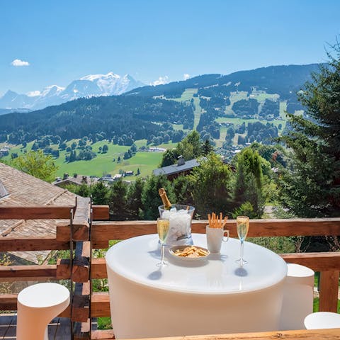 Soak up the stunning views of the Alps from the balcony