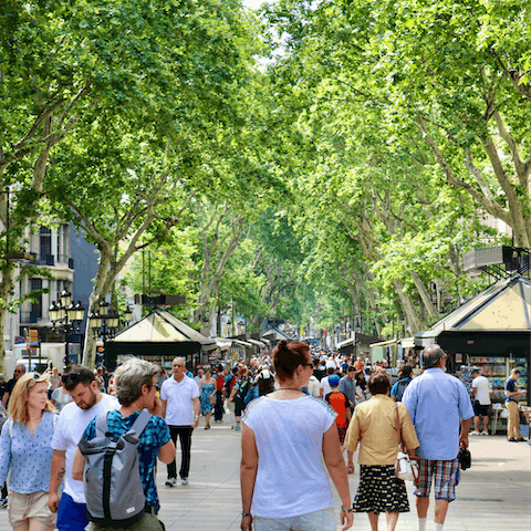 Shop along the tree-lined Las Ramblas or soak up the sunshine from a street-side cafe