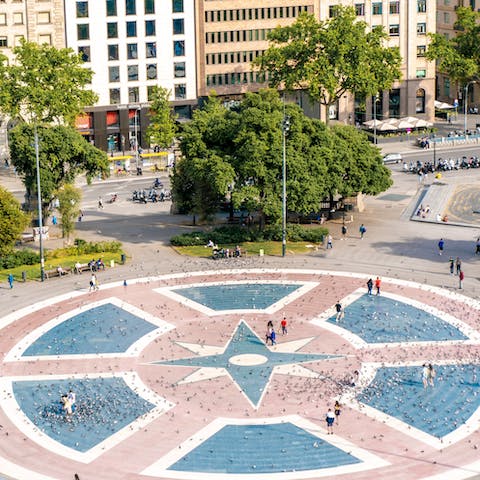 Take the twenty-minute walk to the bustling Plaça de Catalunya for a spot of people-watching by the fountains