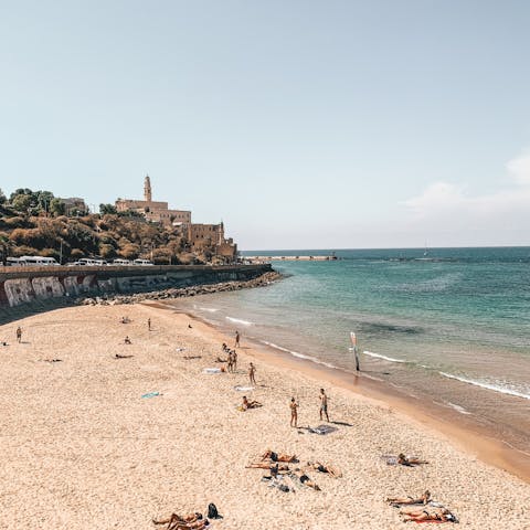 Enjoy a sun-kissed day on the shores of Charles Clore Beach, just a short walk away