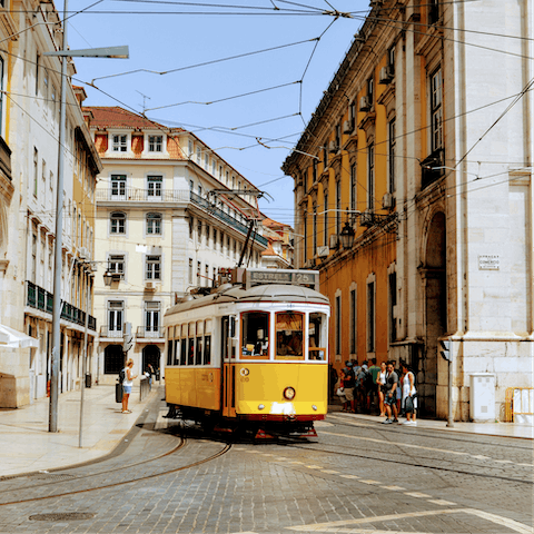 Wind through the steep streets of Lisbon on the rickety 28E tram – the closest stop is at Praça Martim Moniz