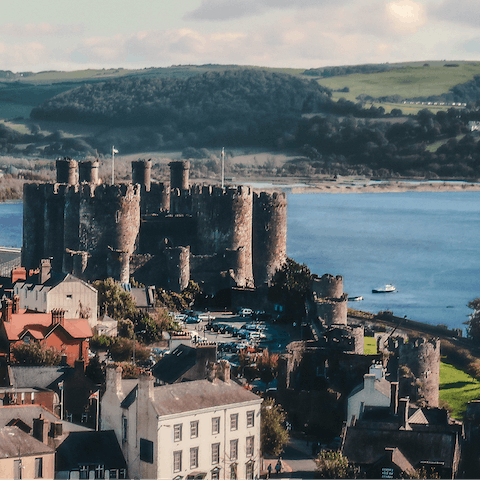 Visit the medieval castle and other landmarks in Conwy, a World Hertigate town on the North Wales coast