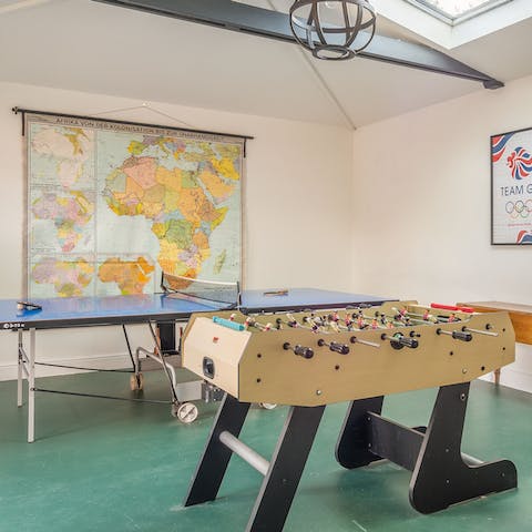 Indulge your competitive side with a round of foosball in the games room