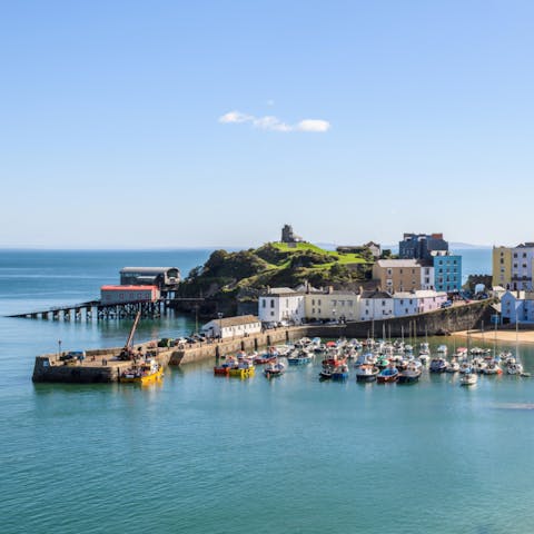 Visit Tenby's colourful harbour and take a boat ride out to Caldey Island from there