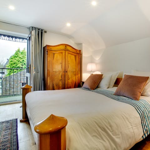 Wake up in a comfortable king-sized bed and stretch your legs on the balcony