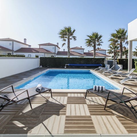 Spend lazy days lounging by the pool or head to the nearby golf course