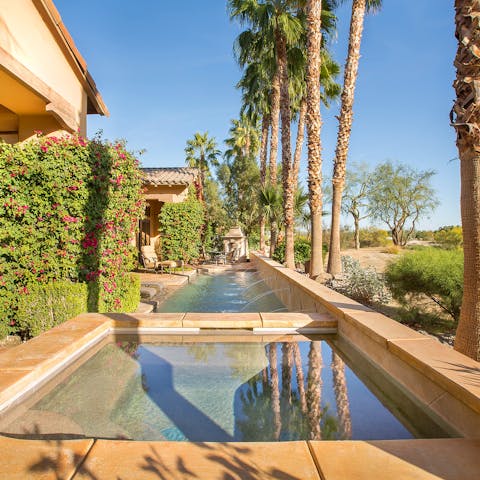 Cool off from desert heat with a dip in the inviting pool