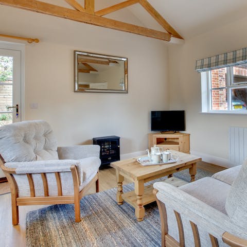 Spend cosy evenings curled up in front of the wood burner