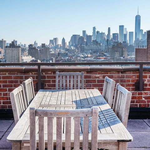 Head up to the building's communal roof terrace and pick out skyscrapers while you eat dinner