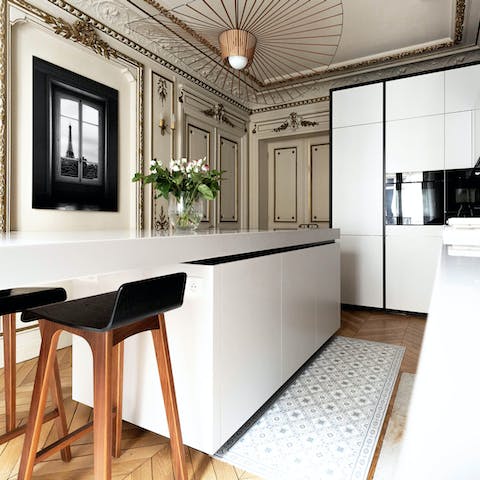 Grab a seat at the breakfast bar in the bright kitchen