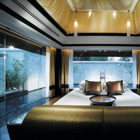 Drift off to sleep in the tranquil bedrooms surrounded by crystal glass and calm waters