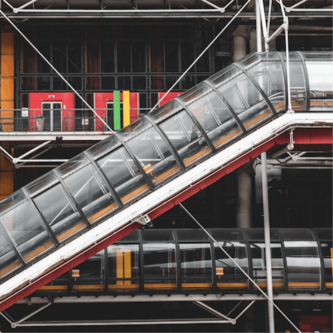 Immerse yourself in the quirky modern art of the Pompidou Centre, just a fifteen-minute walk away 