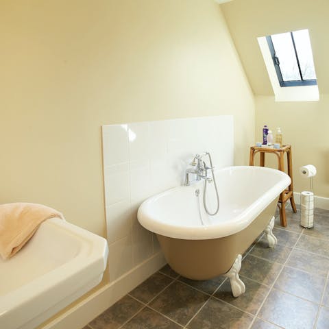 Relax in the roll-top bath after a day out exploring the local area