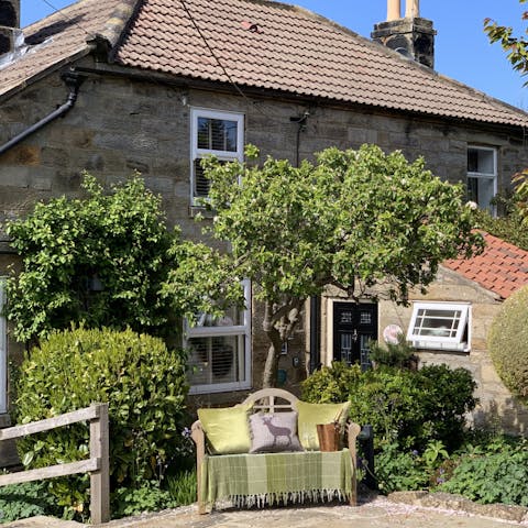 Enjoy the morning sun with a cup of tea on the front patio