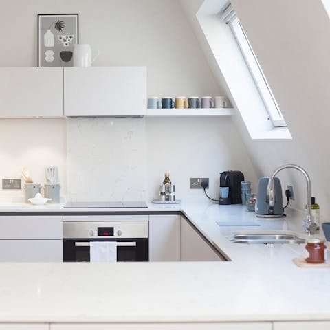 Cook up a feast in the sleek kitchen
