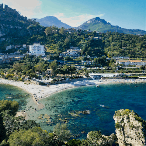 Discover the photogenic city of Taormina, 40km north of Santa Tecla