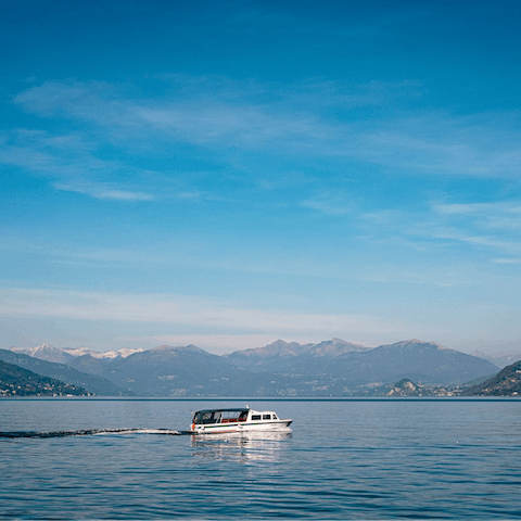 Take a day trip on the private boat to explore Lake Como