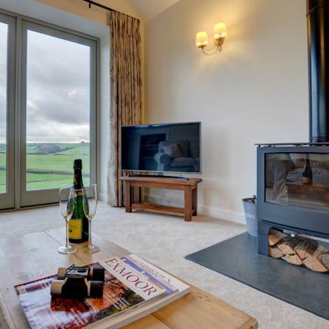 Relax in front of the fireplace after a hike in  Exmoor National Park