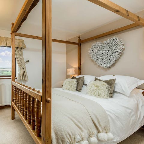Get some rest in the romantic four-poster bed after a long country walk