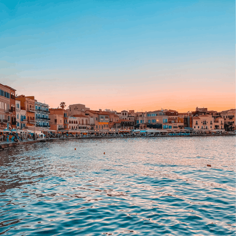 Head to the buzzing coastal town of Chania, a forty-minute drive away