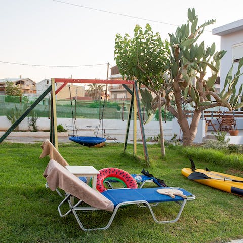 Make the most of the grassy garden where there's a swing set for little ones