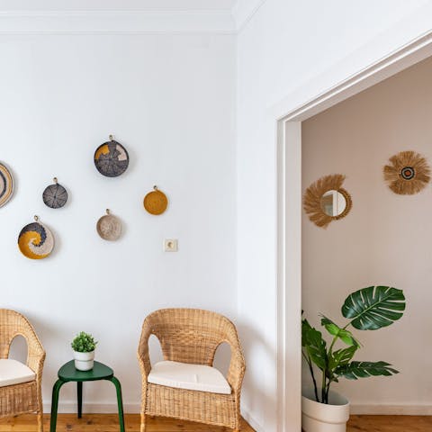 Feel at home amongst artisan crafted wall hangings and pops of plant life