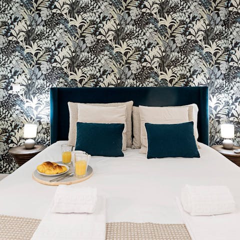 Get some rest in the stylish bedroom after a busy day in Porto