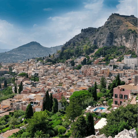 Hop in the car and make the 3km drive up the to the mountainside town of Taormina 