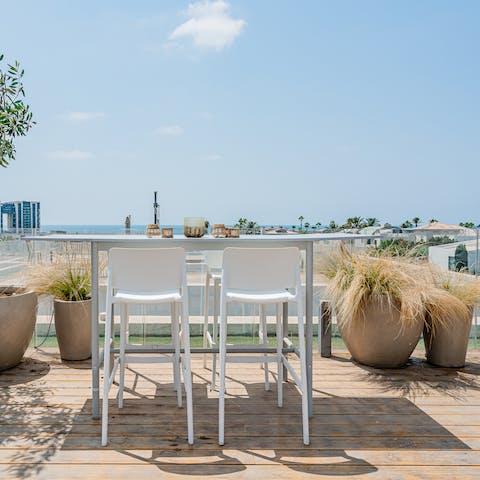 Enjoy views of the Mediterranean Sea from the roof terrace
