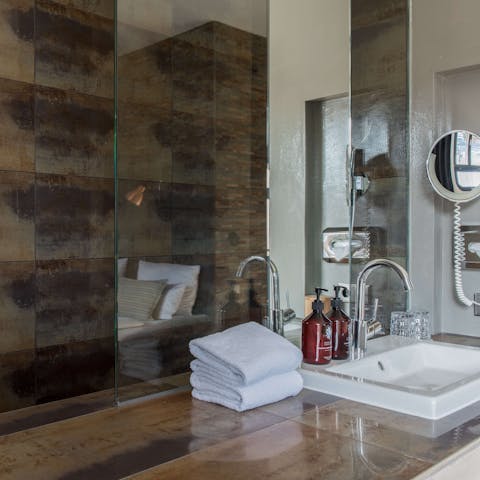 Enjoy a long soak in the sleek modern bathroom