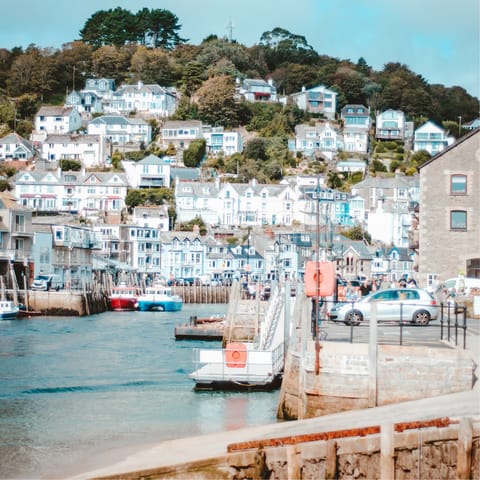 Visit the picturesque fishing harbour of Looe – a thirty-minute drive away