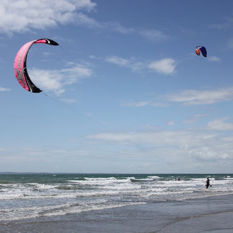 Learn to kitesurf in the shallow tidal lagoon at West Wittering, just 1.5 miles down the road