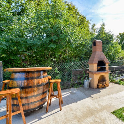 Tuck in to homemade pizzas in your own wood fired pizza oven