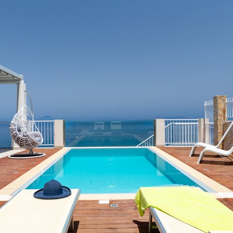 Take a dip in the rooftop pool, or kick back with a good book on a sun lounger