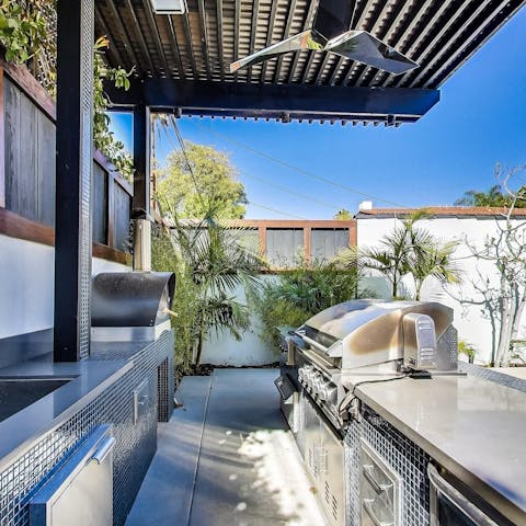 Channel your inner chef and cook up a feast in the outdoor kitchen area