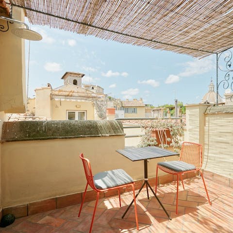 Sip aperitivos on the living room's balcony or enjoy a soak under the outdoor rainfall shower