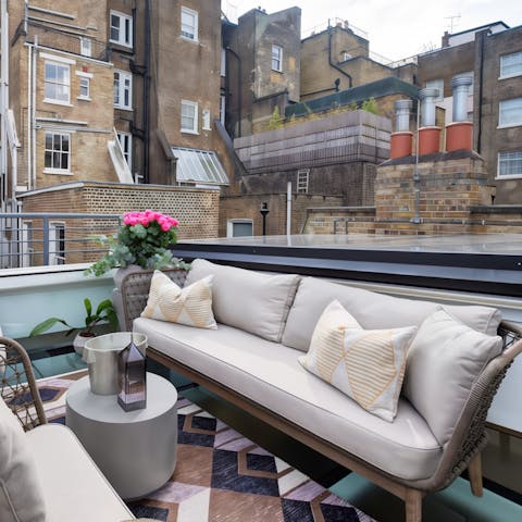 Chill out on the roof terrace – there's a retractable roof