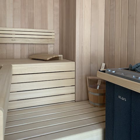 Feel the tension melt away in the private sauna 