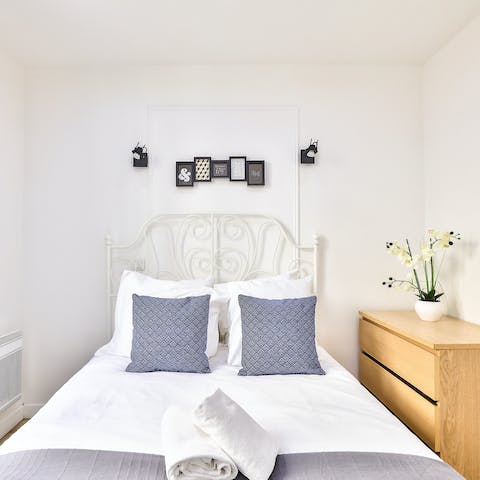 Enjoy a blissful night's sleep in the Parisian-style bedrooms