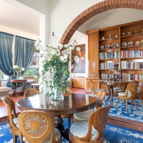 Enjoy board games and books in the elegant reading room, complete with library