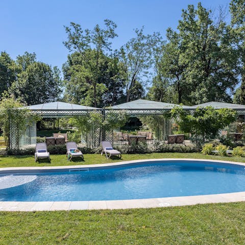 Swim some laps of your outdoor private pool on hot summer days