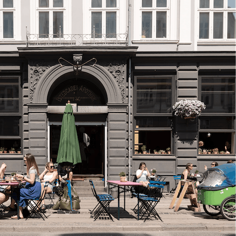 Stay in the vibrant Vesterbro district, full of trendy shops and cafés 
