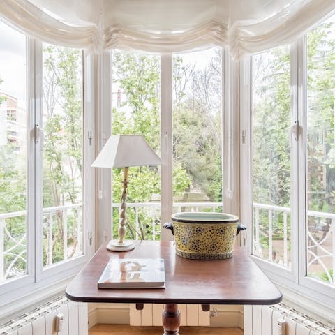 Work from home at the designated desk space – if you can keep yourself from getting distracted by the leafy views 