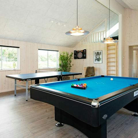 Spark up some fierce rivalries among guests in the games room