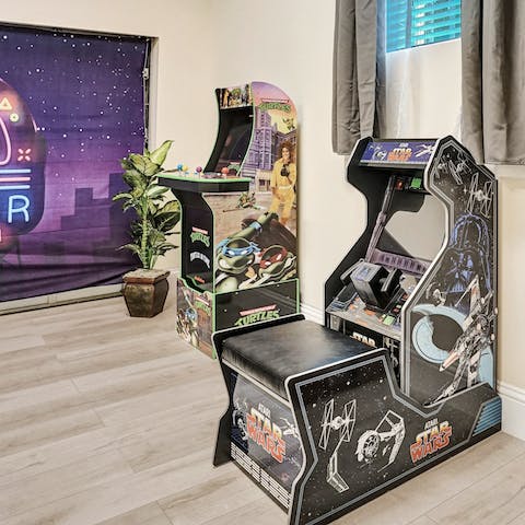 Feel like a kid again in the game room – there's air hockey, table football and old-school arcade games