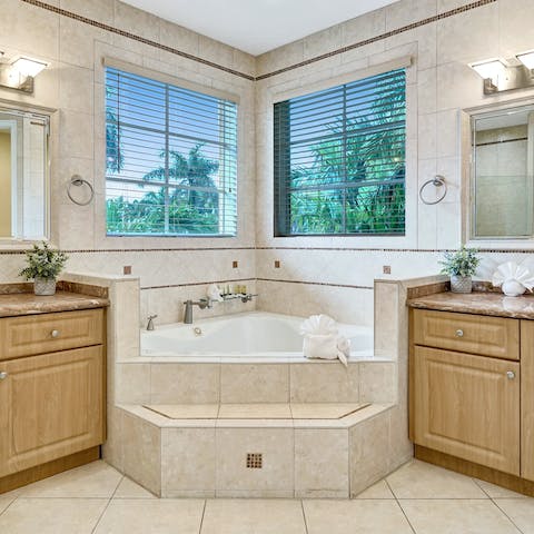 Relax sore muscles in the master bathroom's jacuzzi tub