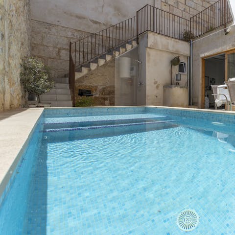 Take a refreshing dip in the private pool to cool off from the midday sun