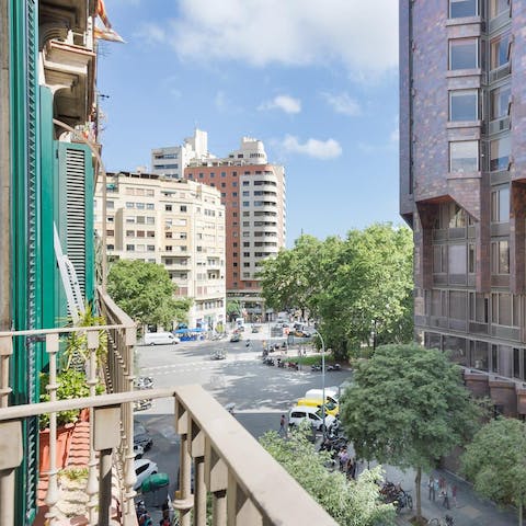 Enjoy a drink on the balcony while taking in views of your Dreta de l'Eixample neighbourhood