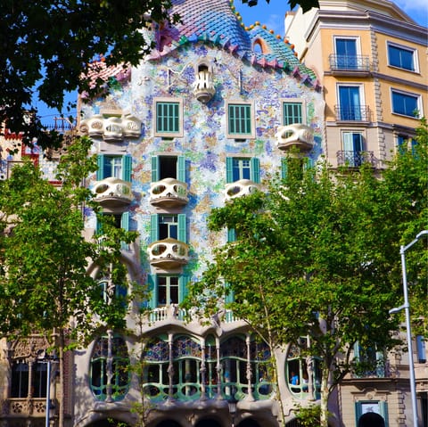 Visit colourful Casa Batlló, a three-minute walk away