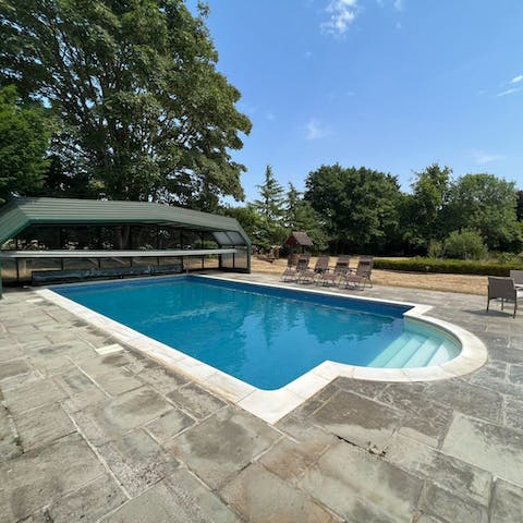 Jump into the home's swimming pool and play games in the refreshing water